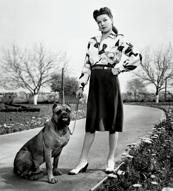 Ann Sheridan The actress at her ranch home in Encino, Los Angeles, with her boxer, Butcher (Warner Brothers, 1943)